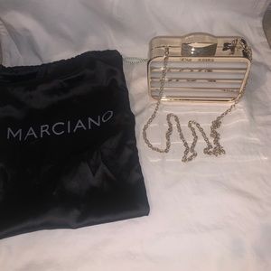 Marciano gold clutch